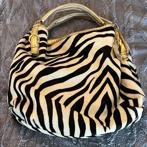 ANTONIO MELANI Black and White Zebra Print Hobo with Gold Accents